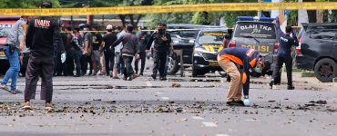 Two attackers believed to be members of a militant network that pledged allegiance to the Islamic State group blew themselves up outside a packed Roman Catholic cathedral during a Palm Sunday Mass on Indonesia’s Sulawesi island, wounding at least 20 people, police said.