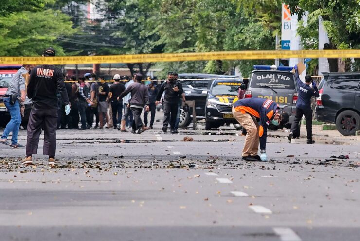 Two attackers believed to be members of a militant network that pledged allegiance to the Islamic State group blew themselves up outside a packed Roman Catholic cathedral during a Palm Sunday Mass on Indonesia’s Sulawesi island, wounding at least 20 people, police said.